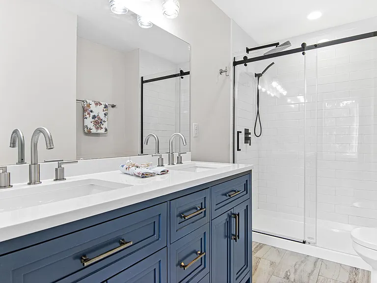 Brand new kitchen with huge tiled shower and waterfall shower head