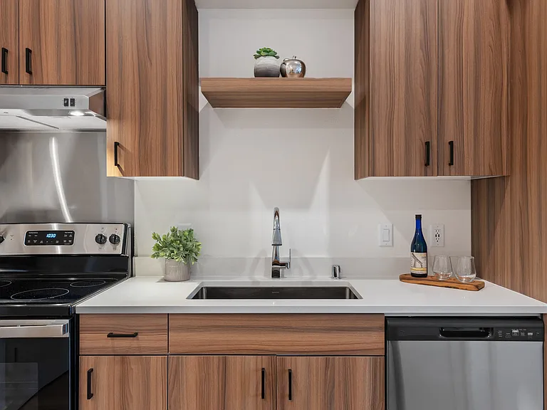 Staged Unit 107. (2BR 2BA) Similar floor plans: 207, 307 ,407, 109, 209, 309 , 409, 118, 218, 318, 418 *Unit features may vary. Inquire with our leasing office to schedule a tour.