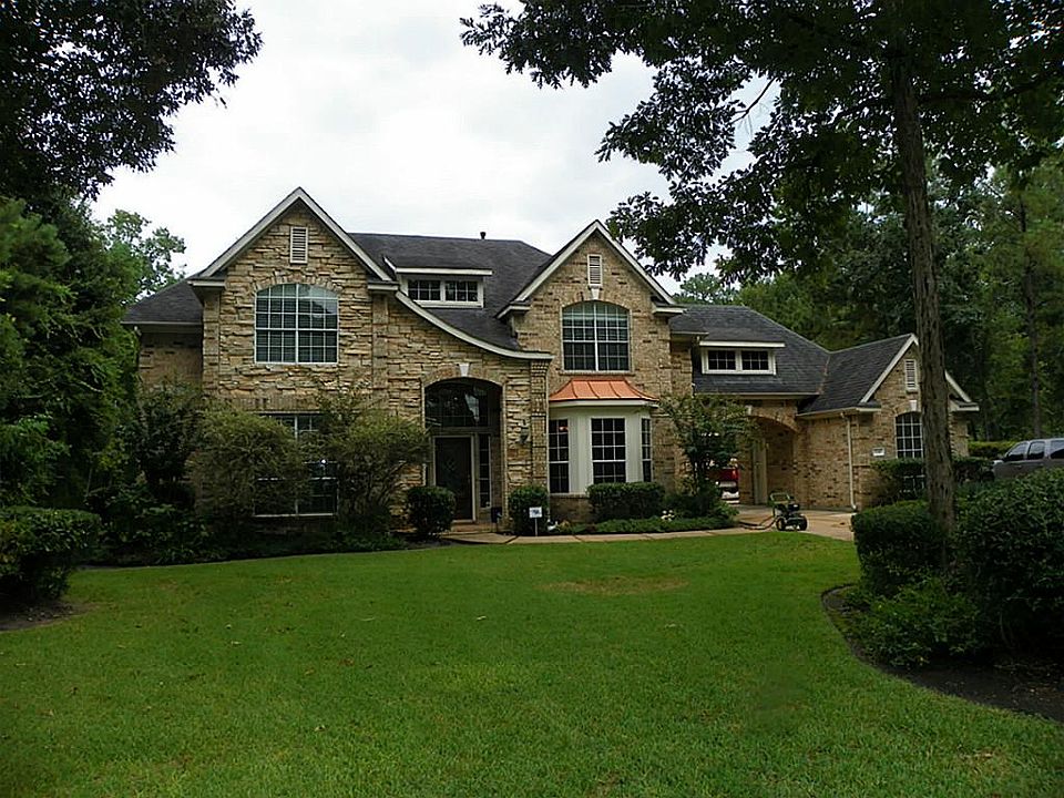 This gorgeous family homes sits on a cul-de-sac on over one acre.