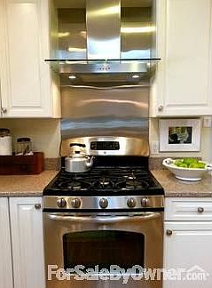 New stainless steel gas stove with hood