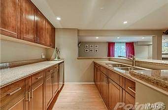 The wet bar in the lower level.