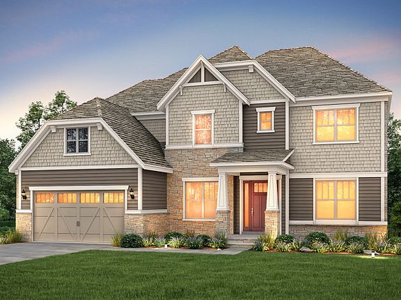 Worthington Exterior 3 features Stone, Siding, Shakes and Covered Front Door