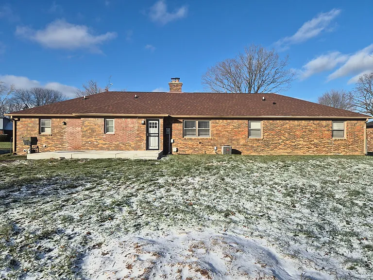 Large fenced in backyard with newly extended patio. Plenty of room for kids and pets.
