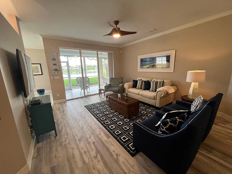 Den with Lanai and lake view