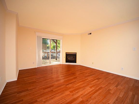 Large Living Room to wooden Deck/Patio.