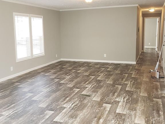 Looking from Kitchen towards large bright living room.