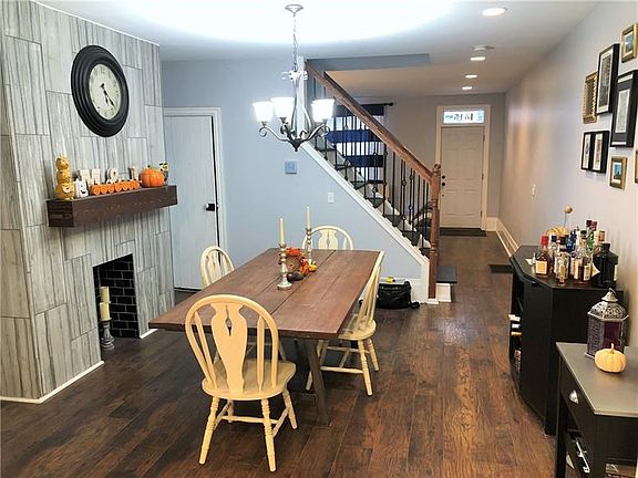 Beautiful spacious Dining Room with mantle/fireplace and built-ins!