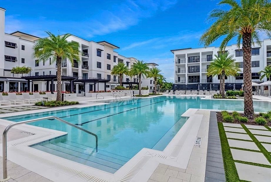Pool area with cabanas.