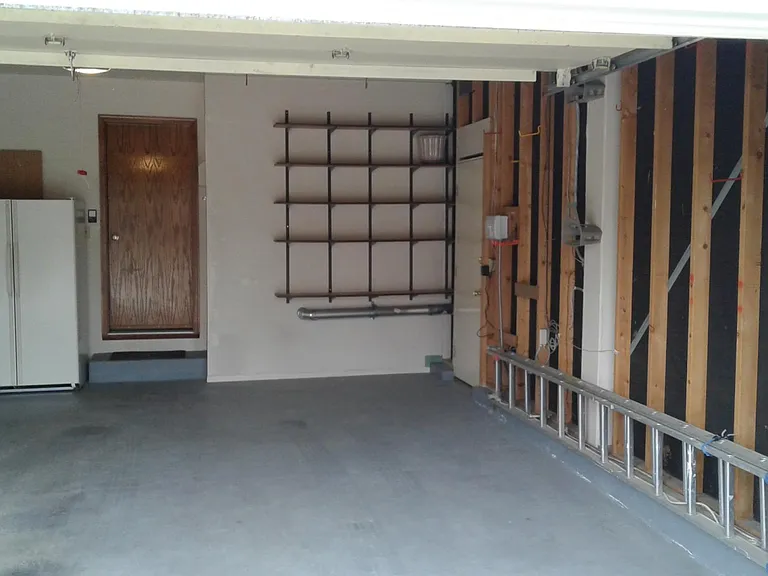 2 car garage with garage door opener.