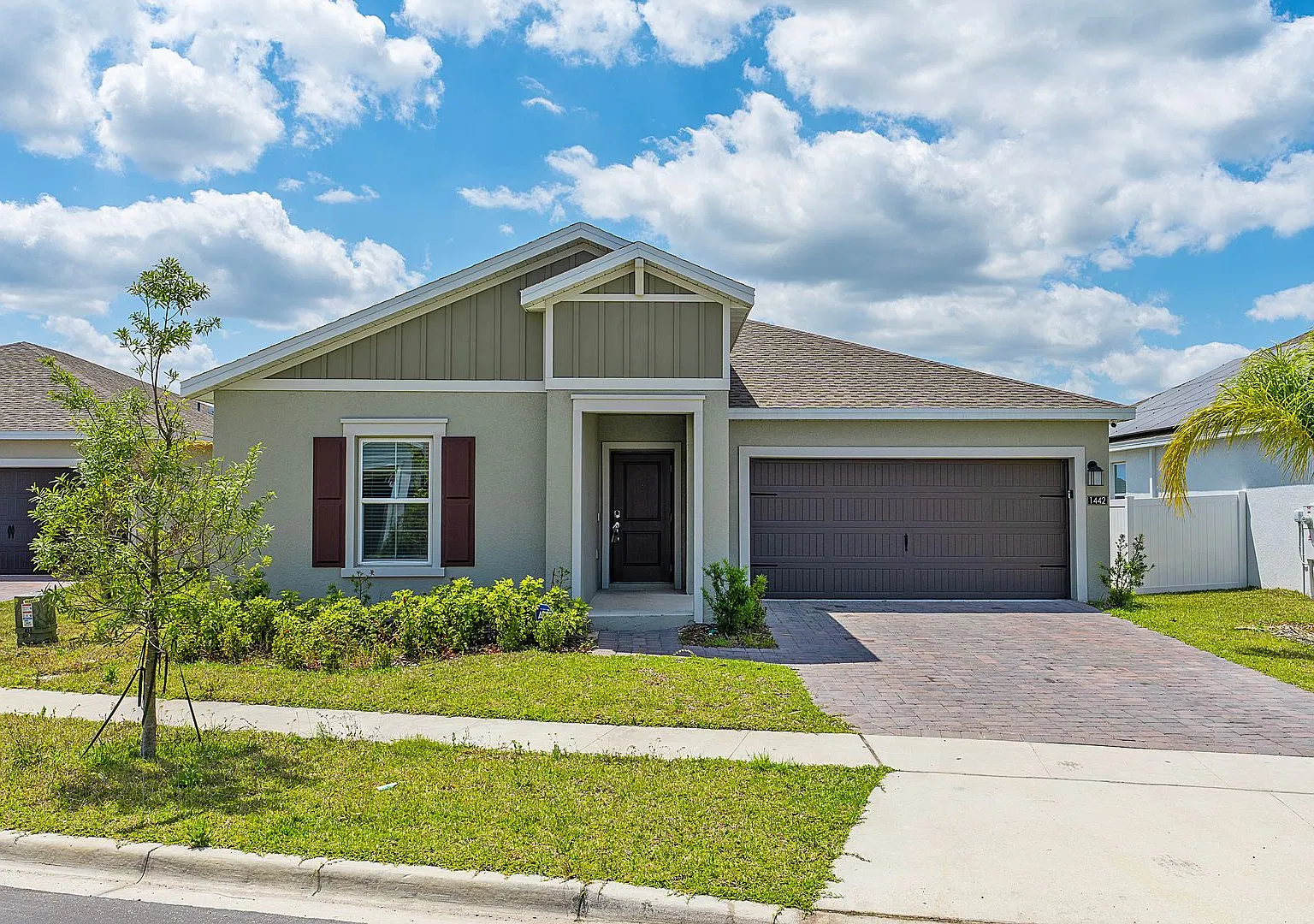 Welcome to 1442 Brentwood Drive, a beautiful 4-bedroom, 2-bathroom single-family home — Photo 1