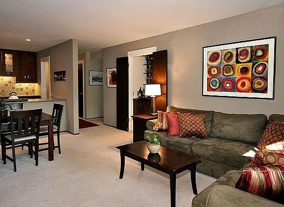 Living room (shown with previous paint colors and furniture for reference)