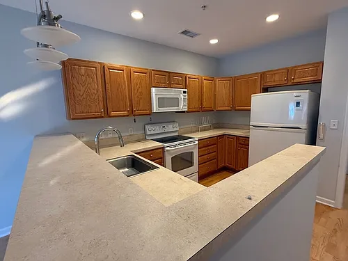 107 Clocktower Dr #207 Photo 1