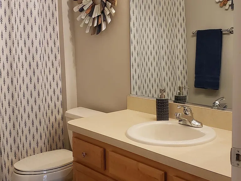 guest bath (bedroom and guest bath area can be closed off with sliding pocket door for guest privacy)