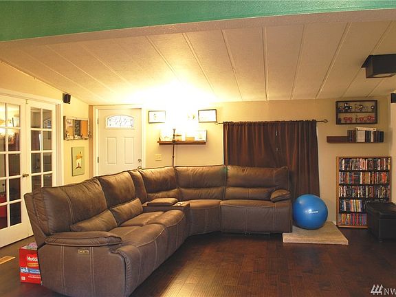 You come inside to a good size living room. Check out the room through the french doors!