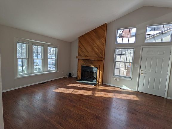 Lots of windows, light and wood burning fireplace