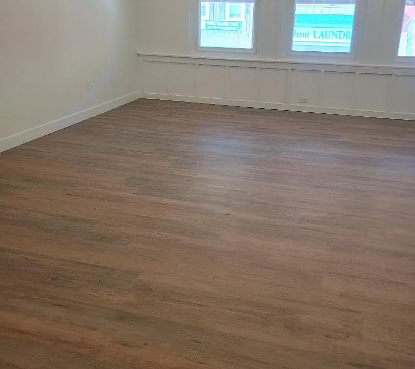 Loft space with laminate flooring throughout