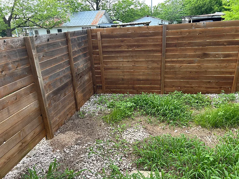 small fenced back yard
