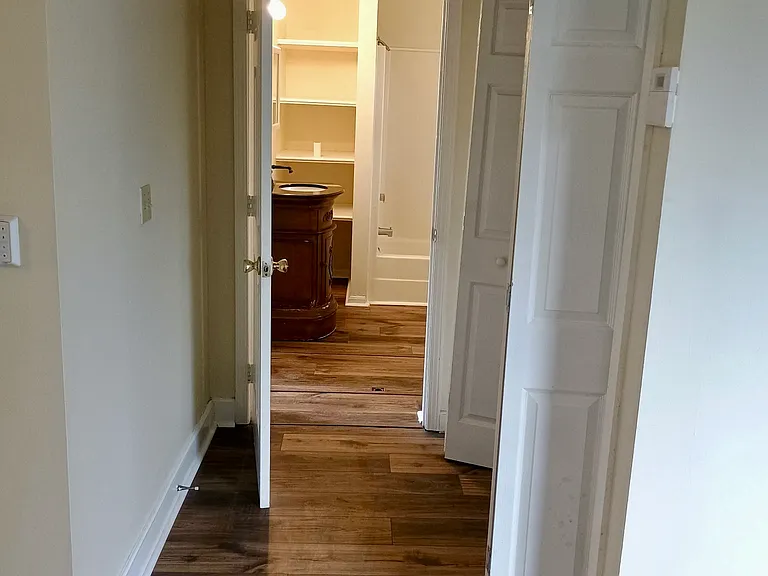 Hallway Leading to Laundry and Bath