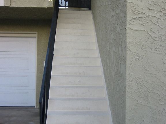 stairs leading to gated unit