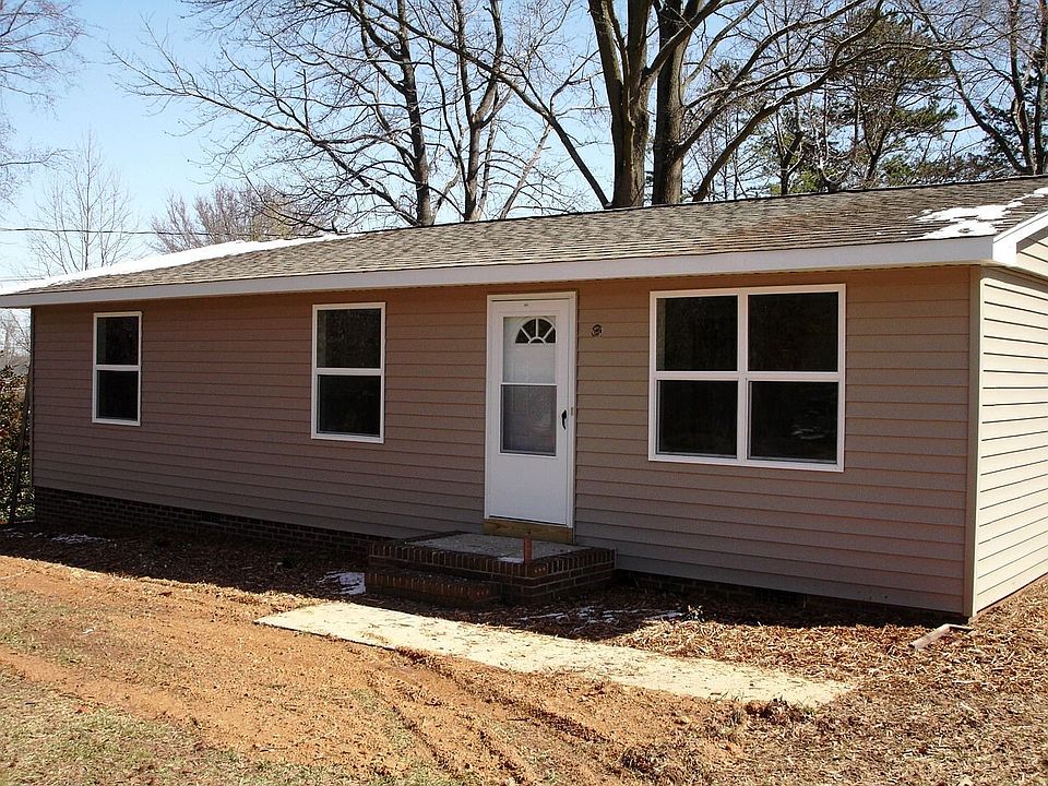 Totally Renovated Inside & Out! New Roof, New Vinyl Siding,Brand New HVAC Unit