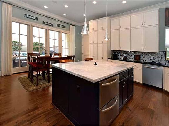 The island features an illuminated marble counter top with LED under lighting!