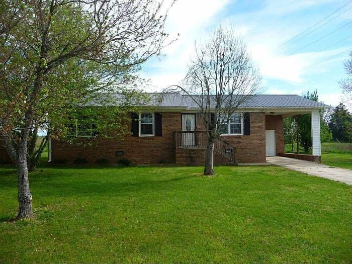 VIEW OF CUTE BRICK RANCH