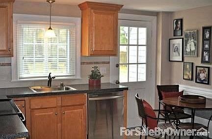 Kitchen
						:
						Newer cabinets with stainless appliances.