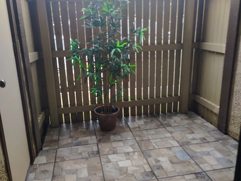 Patio with storage and New ceramic floor!