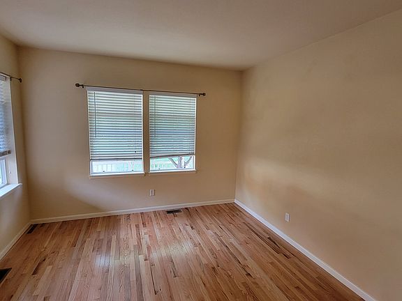 Living room with hardwood floor, main level
