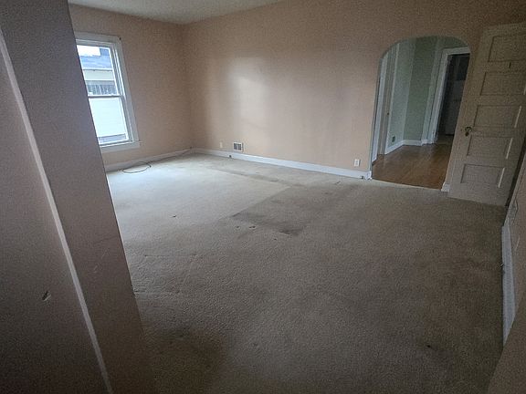 Living room from the front door (prior to carpet cleaning)