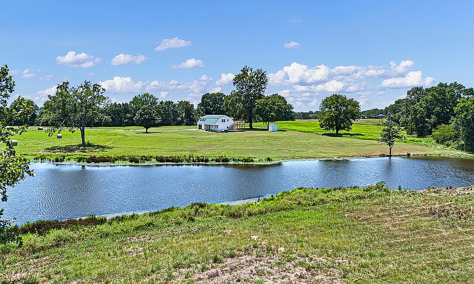 House and stocked pond 
