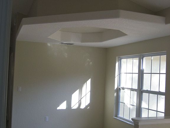 Trey ceiling for dining room with planter shelf