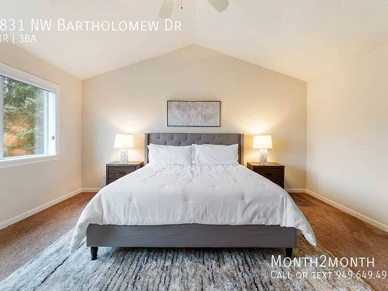 9831 NW Bartholomew Dr — Photo 12