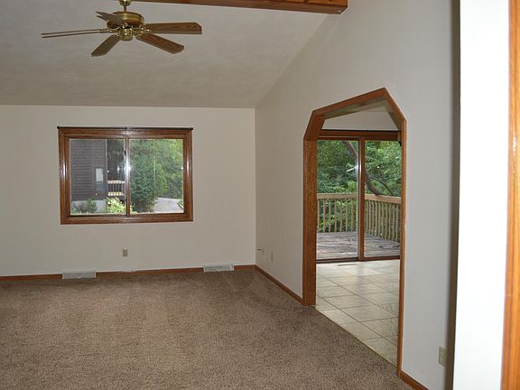 Livingroom leads to dining area and back door deck