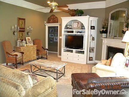 Living area
						:
						Spacious living room with built in and gas fire place.