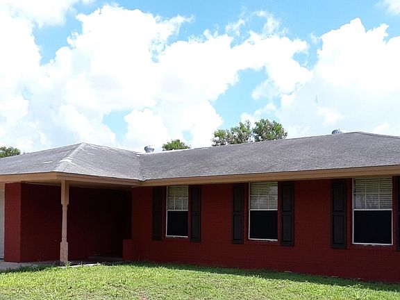 A house with a Two-car Garage plus two additional driveway Parking spaces.
