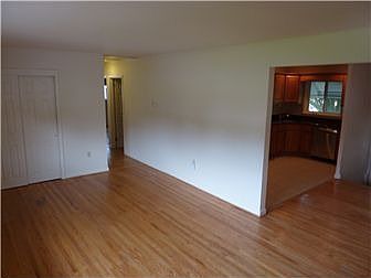 Living Room toward Kitchen and Hallway to BRS