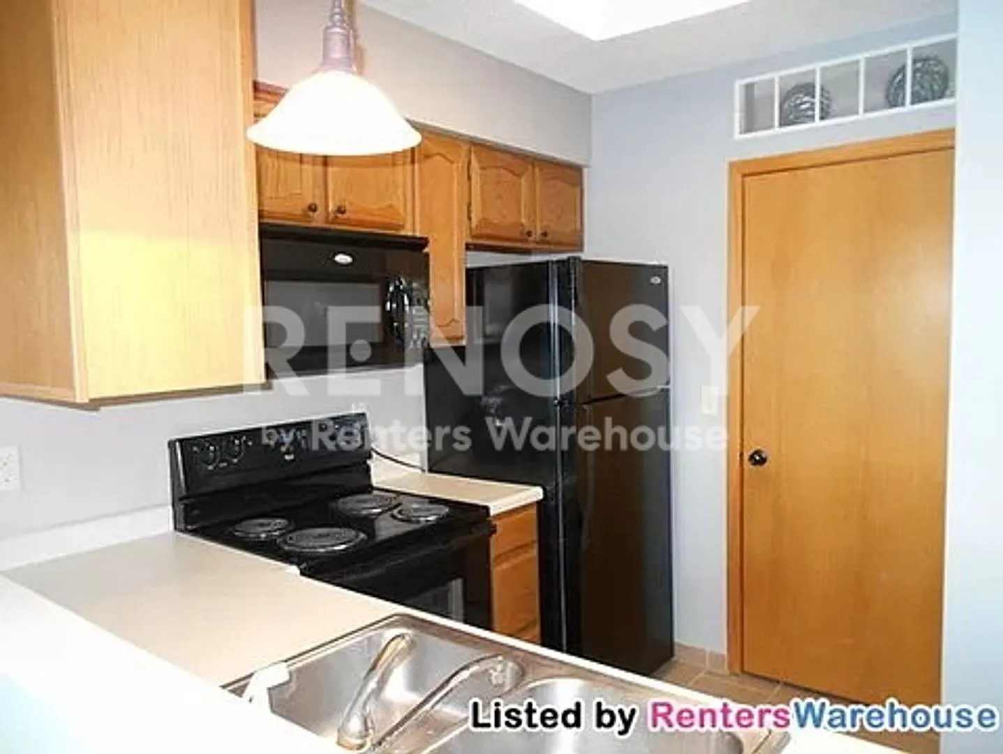 Spacious 3 Bedroom Townhome with Garage, Fireplace & Private Patio | 24 Elton Ridge Ct NW Unit #2... — Photo 3
