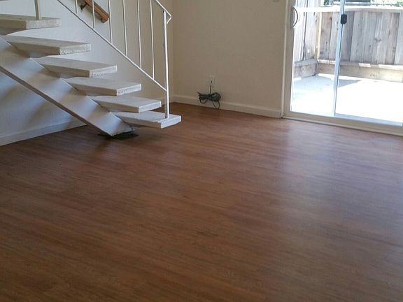 living room stairs up to 2 bed 1 bath
patio door to outside patio