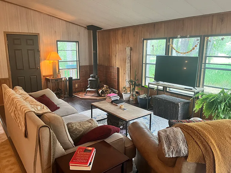 living room when furnished (see wood-burning stove)