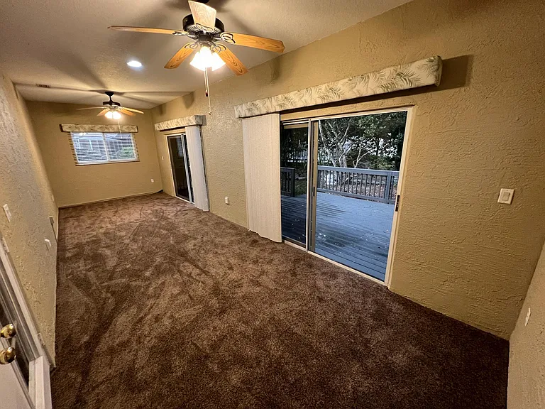 Large Bonus/Play/Game room opening to beautiful, private, oversized patio/deck.