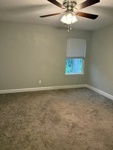 upstairs bedroom # 3 backyard facing window, blings and ceiling fan included