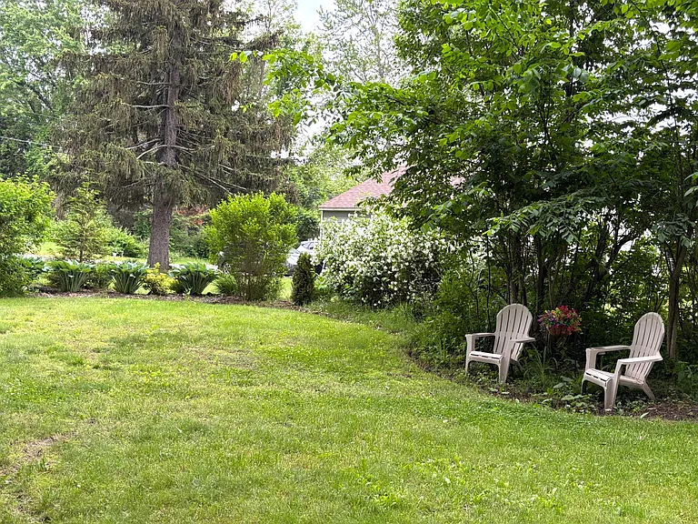 Enjoy a small, beautifully landscaped private yard.