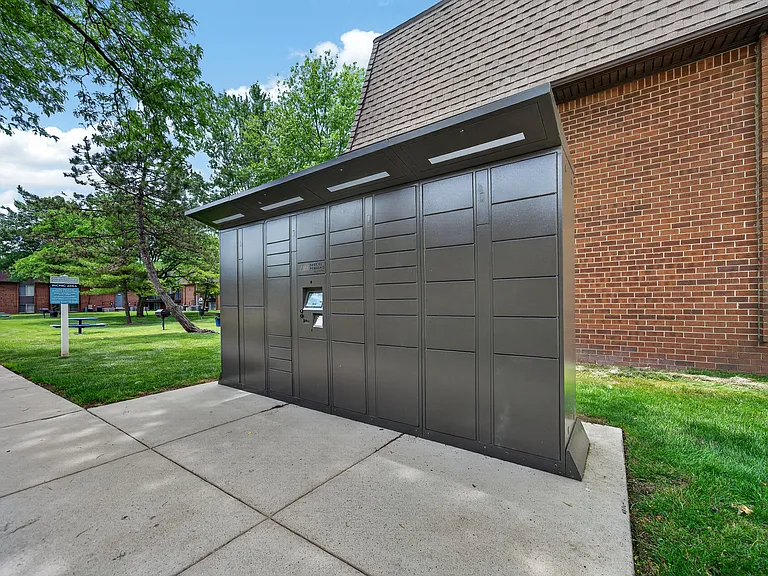 24/7 secured Package Lockers at Drawbridge Apartments East in Harrison Township, MI
