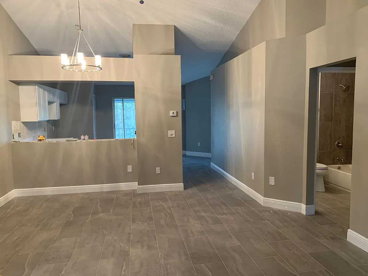 Dining Room, Hall, and Guest Bathroom view. - 112 Reserve Cir #208