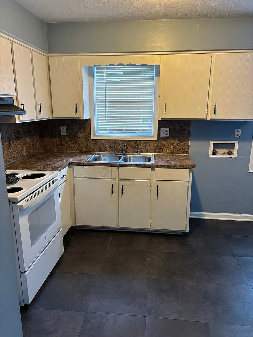 Cozy & Convenient Living with Eat-In Kitchen, Storage & Covered Parking! — Photo 3