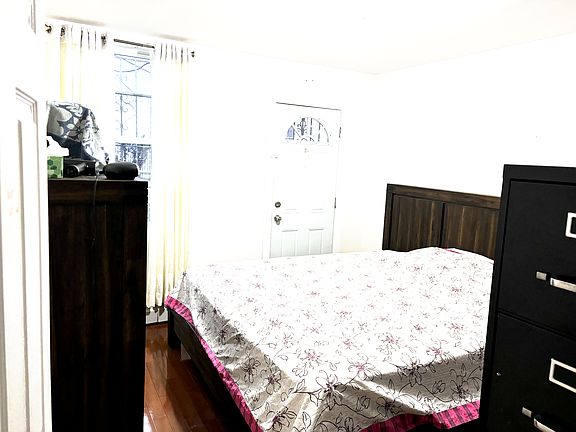 Bedroom 3 - Fits King bed and 2 dressers. Also has closet attached and door to balcony