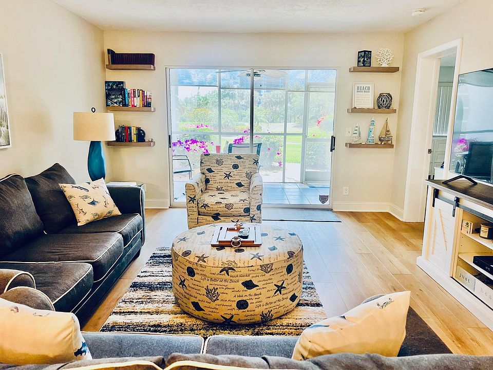 Spacious living area opens to a covered lanai