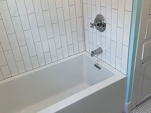 new tile, soaking tub/shower