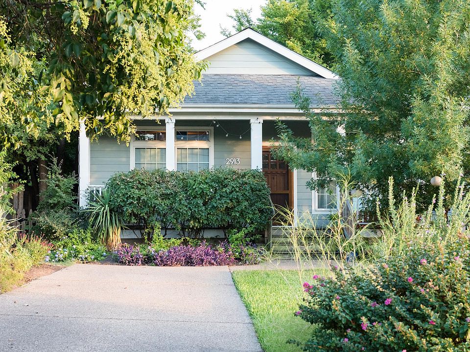 2 car driveway and front of 2913 Front porch with seating